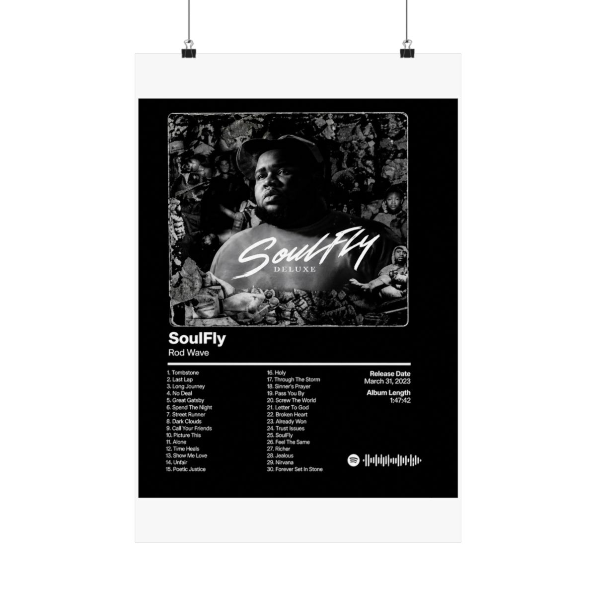 A framed black and white poster of the "SoulFly Deluxe" album by Rod Wave. The poster displays the album title, artist, tracklist, release date, and album length. The image is set against a dark... - alternate angle 5, merchandise