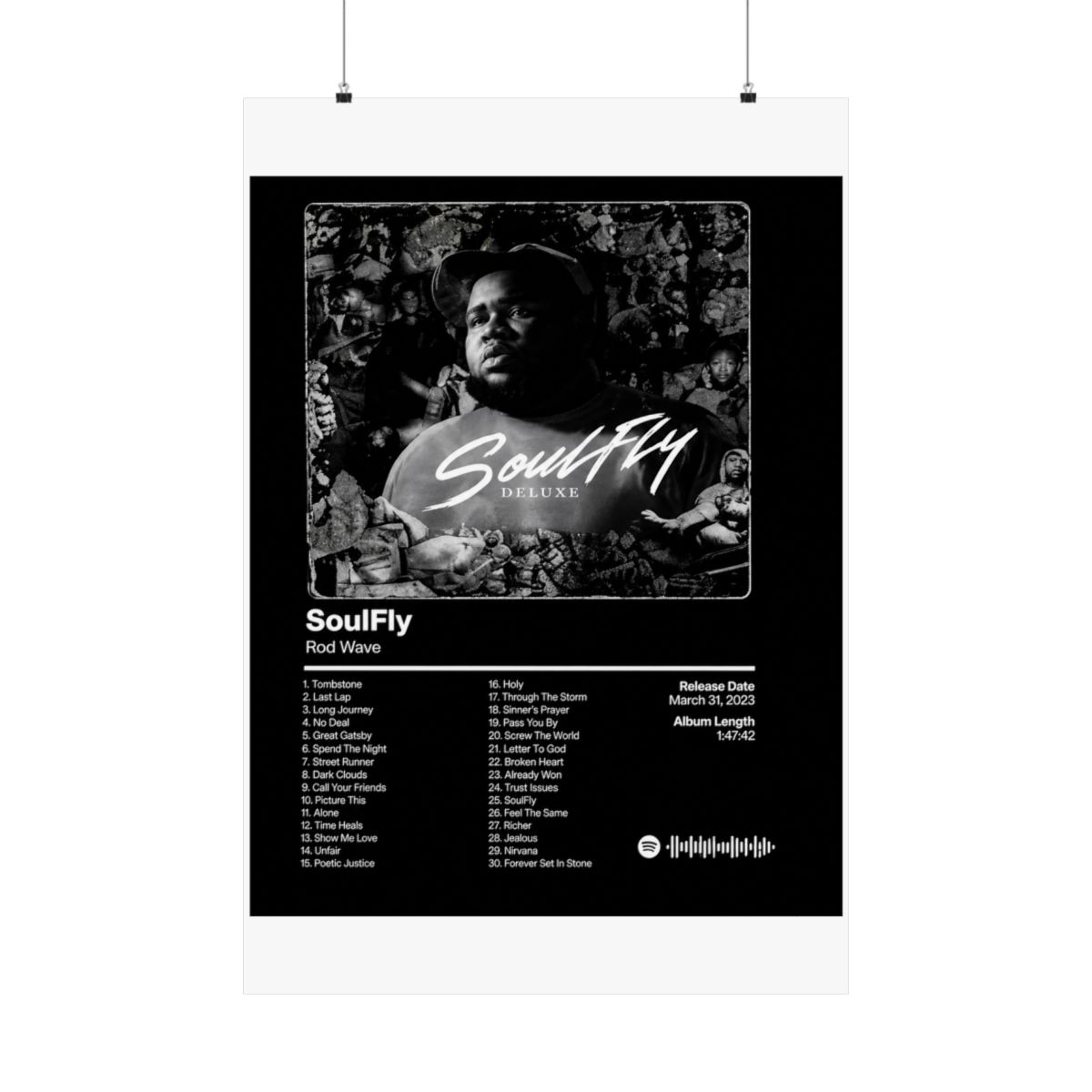 A framed black and white poster of the "SoulFly Deluxe" album by Rod Wave. The poster displays the album title, artist, tracklist, release date, and album length. The image is set against a dark... - alternate angle 4, merchandise